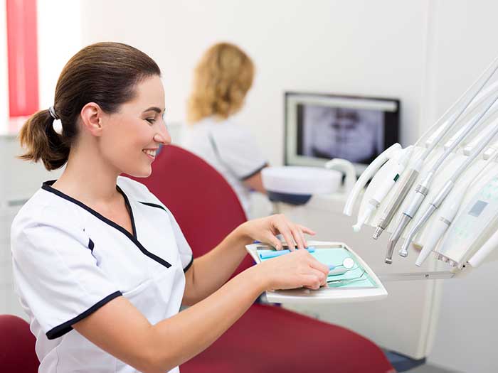 Dentist arranging the instruments