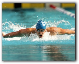 A boy swimming in the pool