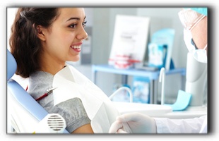 Dentist treating the patient