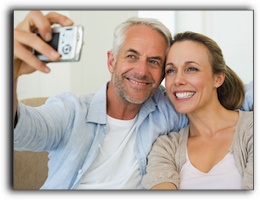 Happy couple taking a photo